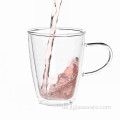 Kaffeetasse aus Glas mit Metallhalter